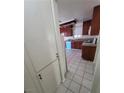View of a kitchen with tiled flooring and rich, dark cabinetry at 500 Prescott St, Las Vegas, NV 89110