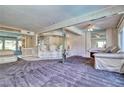 Cozy living room with a fireplace, bar, and comfortable seating at 940 Vegas Valley Dr, Las Vegas, NV 89109