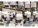 An aerial view of residences in a community featuring tile roofs and desert landscaping at 7820 Esteem St, Las Vegas, NV 89131