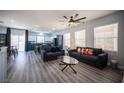Spacious living room with bar seating, flowing seamlessly into the kitchen area at 10628 Calf Creek Ct, Las Vegas, NV 89129