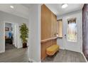 Inviting foyer features modern decor, accent wall, and bench seating at 333 Mandarin Hill Ln, Henderson, NV 89012