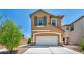 Charming two-story home with a two-car garage, desert landscaping, and striking curb appeal at 3757 Via Geneva, Henderson, NV 89052
