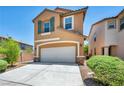Charming two-story home with a two-car garage, desert landscaping, and striking curb appeal at 3757 Via Geneva, Henderson, NV 89052