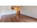 Open-concept living room with hardwood floors and bright natural light at 2451 N Rainbow Blvd # 1116, Las Vegas, NV 89108