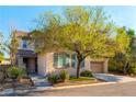 Charming two-story home featuring a well-manicured front yard and a two-car garage at 7057 Fort Union Ct, Las Vegas, NV 89179