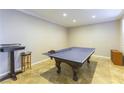 Spacious game room with a ping pong table and recessed lighting at 7057 Fort Union Ct, Las Vegas, NV 89179
