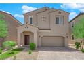Charming two-story home with well-maintained lawn and a convenient two-car garage at 9947 Tucket Point Ct, Las Vegas, NV 89178