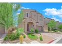Charming two-story home with desert landscaping and a convenient two-car garage at 9947 Tucket Point Ct, Las Vegas, NV 89178