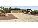 A well-kept home with a two-car garage, solar panels, and low-maintenance landscaping at 7404 Wittig Ave, Las Vegas, NV 89131