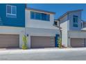 Modern townhome featuring a two-car garage and contemporary design at 2523 Campaldo St, Henderson, NV 89044