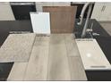 Interior design selection featuring gray vinyl plank floors, carpet, and brushed steel faucet at 4205 Zilker Park Ave, North Las Vegas, NV 89081