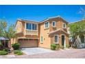 Inviting two-story home with a well-maintained exterior, attached garage and desert landscaping at 8368 Creek Canyon Ave, Las Vegas, NV 89113