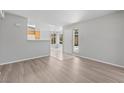 Bright living room with hard surface floors, neutral paint and an open floorplan at 5710 E Tropicana Ave # 1184, Las Vegas, NV 89122
