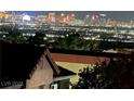 Night cityscape view, showcasing the home's prime location in a vibrant urban setting at 2110 Los Feliz St # 2091, Las Vegas, NV 89156