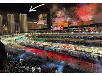 Aerial view of city skyline with fireworks display at 125 E Harmon Ave # 2318, Las Vegas, NV 89109
