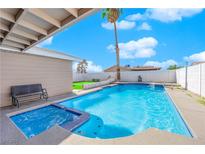 Inviting pool with spa and patio area, perfect for relaxation at 4657 Warner Pl, Las Vegas, NV 89115