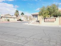Street view of Epping Terrace community with well-maintained landscaping and signage at 3843 Terrazzo Ave # 0, Las Vegas, NV 89115