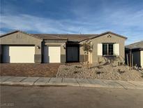New home exterior with two-car garage and landscaped front yard at 578 Jerry Bird Ct, Las Vegas, NV 89123