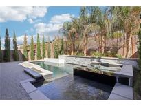 Luxury backyard oasis featuring a stunning pool and spa at 2144 Havensight Ln, Henderson, NV 89052