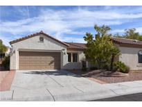 Charming single-story home boasting a well-maintained yard and a convenient two-car garage at 2138 Fort Halifax St, Henderson, NV 89052