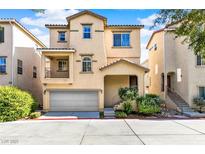 Tan three-story house with attached garage and landscaping at 4750 Newby Hall Ct, Las Vegas, NV 89130