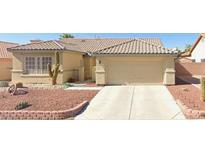 One-story house with desert landscaping and a two-car garage at 5025 Vista Loma Way, North Las Vegas, NV 89031