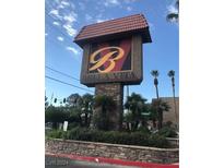 Decorative community sign featuring a stone base and an ornate letter B logo at 5317 Indian River Dr # 295, Las Vegas, NV 89103