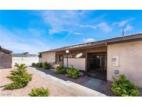 Charming condo featuring well-maintained landscaping, neutral tones and serene curb appeal at 3008 Saint George St # B, North Las Vegas, NV 89030