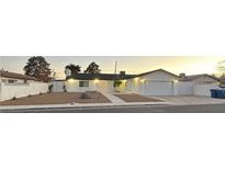 Newly renovated single-story home with a two-car garage and landscaped yard at 4959 Idaho Ave, Las Vegas, NV 89104