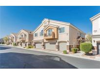 Two story townhome with attached two-car garage and balcony at 10111 Aspen Rose St # 101, Las Vegas, NV 89183