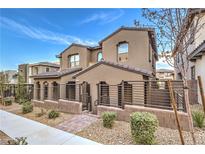 Two-story house with modern facade and landscaped front yard at 11712 Emerald Lake Ave, Las Vegas, NV 89138