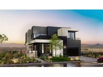 Stunning modern two-story home with black and white accents and professionally landscaped front yard at 500 Overlook Rim Dr, Henderson, NV 89012