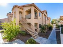 Two-story building with stairs and walkway at 2110 Los Feliz St # 1097, Las Vegas, NV 89156