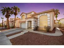 Charming two-story home featuring desert landscaping, a two car garage, and classic architecture at 8737 Autumn Valley Ave, Las Vegas, NV 89129