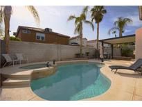 Inviting pool with spa and patio; perfect for relaxation at 8737 Autumn Valley Ave, Las Vegas, NV 89129