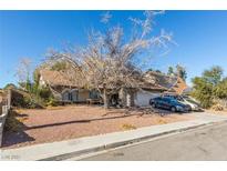 Ranch style home with mature tree and driveway parking at 4245 Seville St, Las Vegas, NV 89121