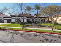 Stunning luxury home with a beautifully landscaped front yard at 1529 Villa Rica Dr, Henderson, NV 89052