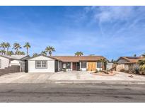 Newly renovated single story home with a modern facade and landscaped front yard at 4754 Monterrey Ave, Las Vegas, NV 89121