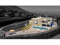 Luxury home with pool and landscaped yard; hilltop location at 318 Shaded Canyon Dr, Henderson, NV 89012