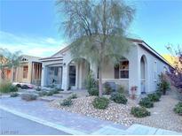 Single-story home with covered porch and landscaped yard at 36 Honeymoon Dr, Henderson, NV 89011