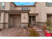 Charming townhome with a one-car garage and inviting front entrance at 5372 Silver Branch Ave, Las Vegas, NV 89118