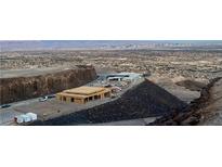 Aerial view of a house under construction with a city view in the background at 495 Cityview Ridge Dr, Henderson, NV 89012