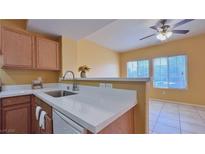 Charming kitchen featuring updated white countertops and stainless steel sink at 2020 Rancho Lake Drive Dr # 205, Las Vegas, NV 89108