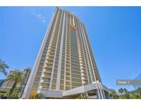 High-rise building exterior, showcasing architectural details and landscaping at 145 E Harmon Ave # 2321, Las Vegas, NV 89109