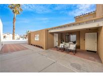 Inviting patio with seating area, perfect for outdoor dining at 5145 Tennis Ct, Las Vegas, NV 89120