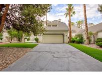 Charming single-Gathering home with a two-car garage, concrete driveway, and mature trees at 3146 Bel Air Dr, Las Vegas, NV 89109