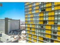 This high-rise building features a modern design with many windows offering city views at 3722 Las Vegas Blvd # 2309, Las Vegas, NV 89158