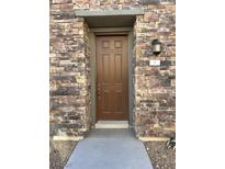 Inviting front door entrance with stone exterior at 7368 N Decatur Blvd # 1, Las Vegas, NV 89131