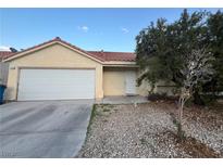 Charming single-story home featuring a two-car garage and low maintenance landscaping at 2536 Grand Basin Dr, Las Vegas, NV 89156