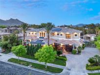 Luxury home with solar panels, pool, and mountain views at 10308 Rocky Mesa Ct, Las Vegas, NV 89144